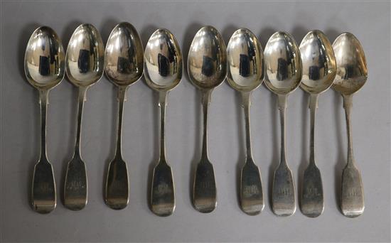 A set of nine Victorian silver fiddle pattern teaspoons, London, 1862.